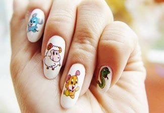 Рисунки животных на ногтях - фото 1